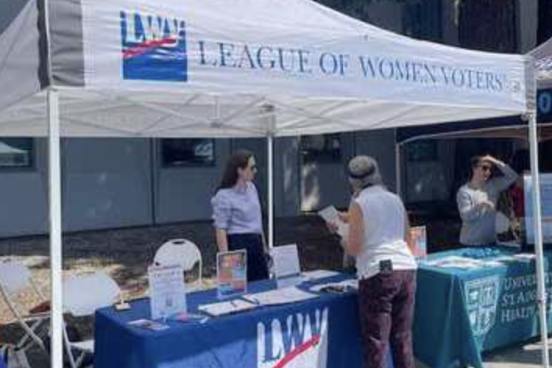 Representatives from the Sonoma County LWV preparing to  talk with students.