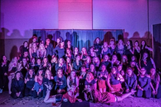The cast of the show pose for a photo