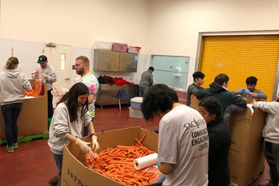 Sac State students at Redwood Empire Food Bank. They bagged over 5,000 pounds of carrots!