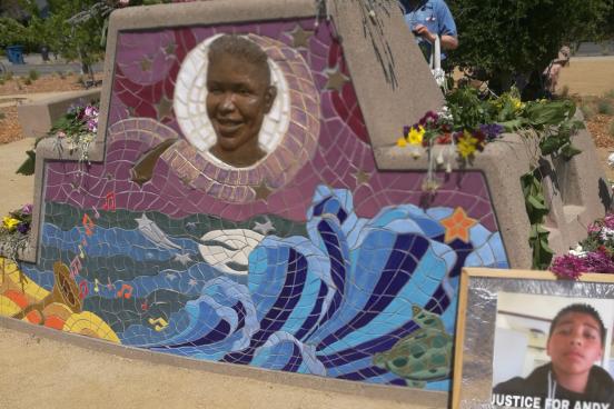 Stone and mosaic memorial depicting Andy Lopez