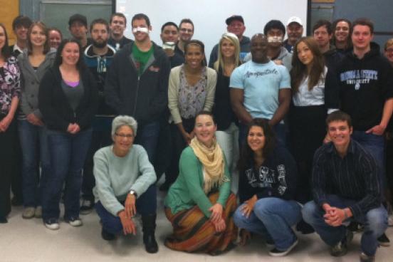 Dr. Liz Thach and a group of service learning students