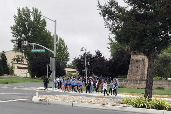 Students gathering at crosswalk outside SSU
