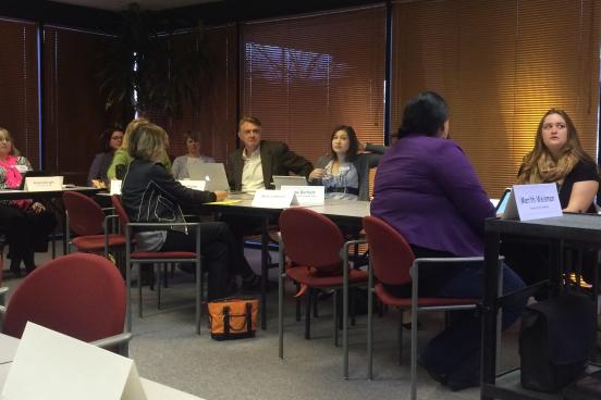 Nonprofit professionals listening to a Social Jeopardy question.