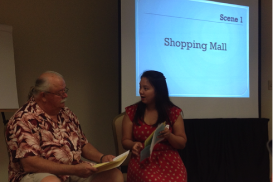 Trang Le, a Student Health Coach, role plays working with a community member to better understand how to manage his health information.