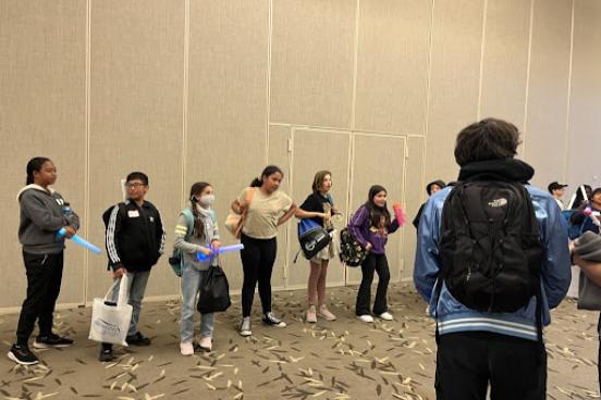 Visiting students checking in for event