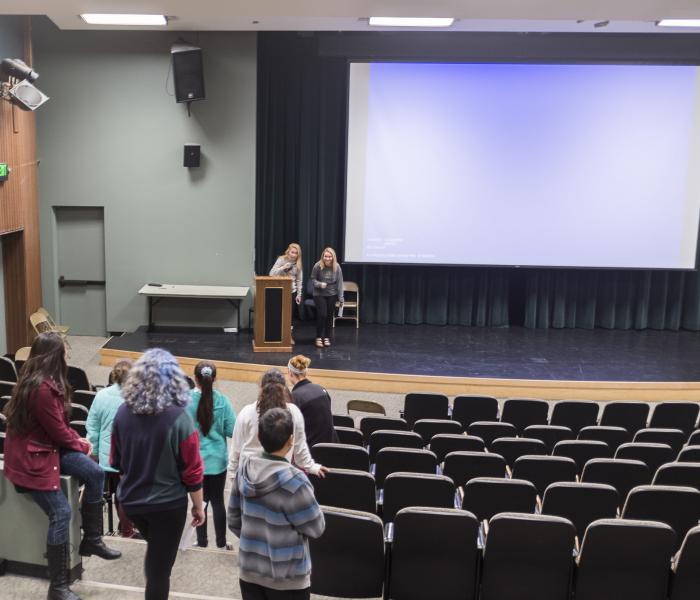Students visit a lecture hall