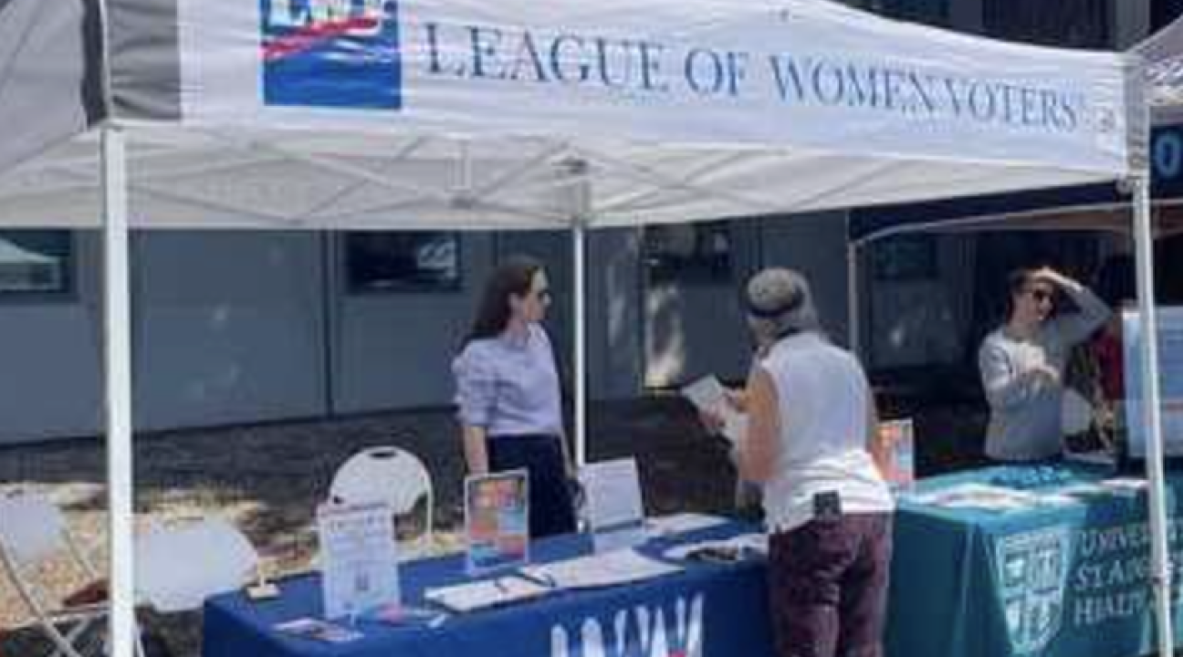 Representatives from the Sonoma County LWV preparing to  talk with students.