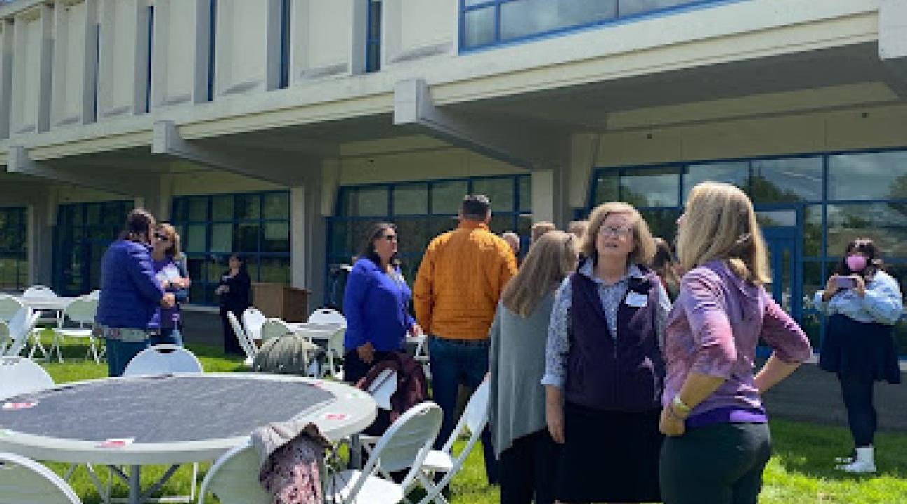 Students and faculty at an event