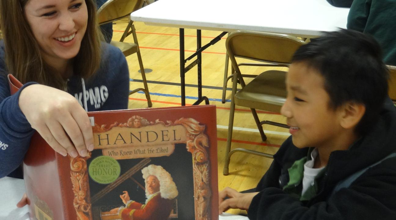 SSU service-learner and Luther Burbank student enjoying reading together.