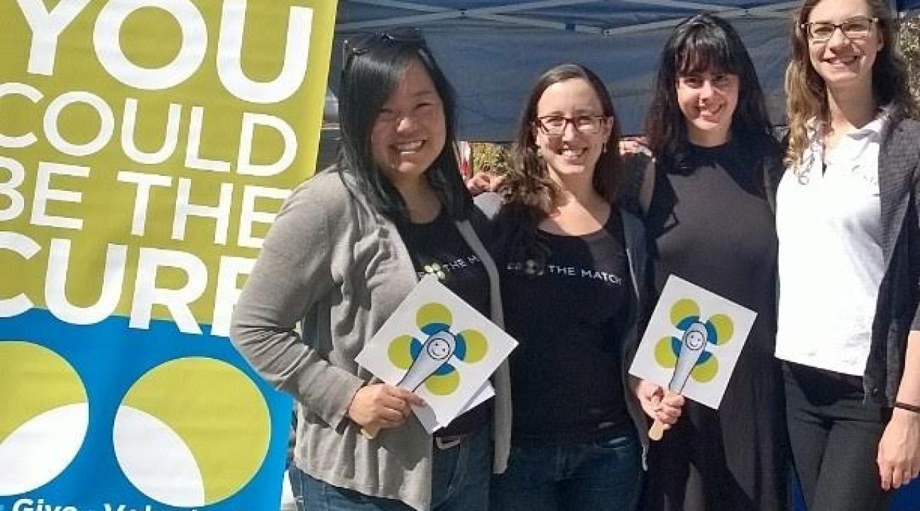 Be The Match representatives tabling during Community Partner Thursdays.