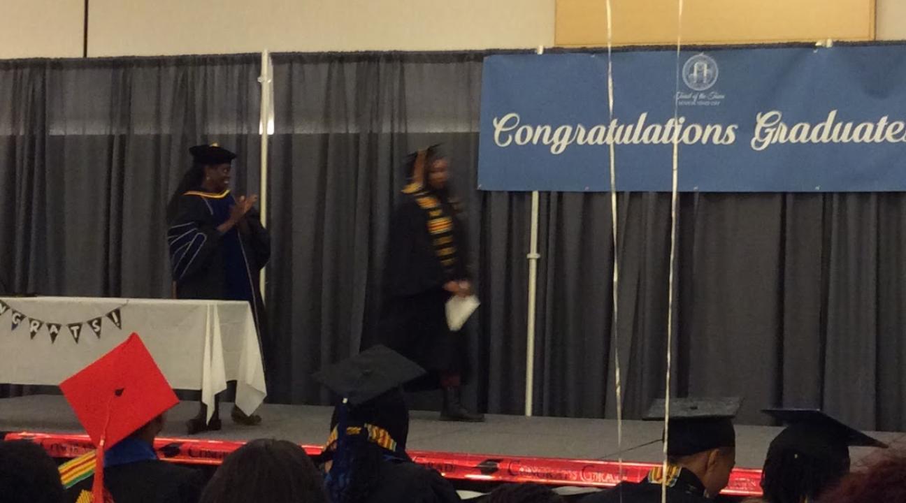 Graduates walking the stage
