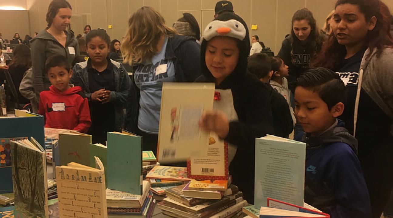 The kids choosing their books with their buddies