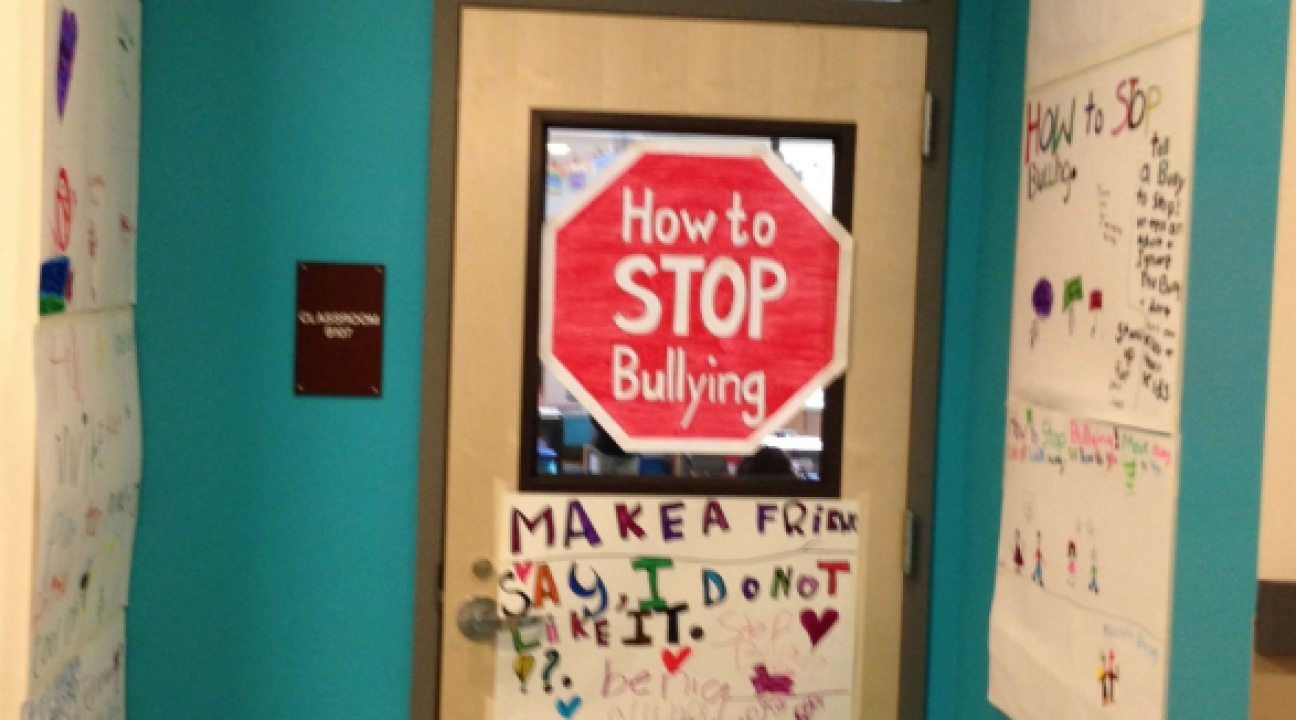 Students made colorful informative posters to educate the school about bullying.
