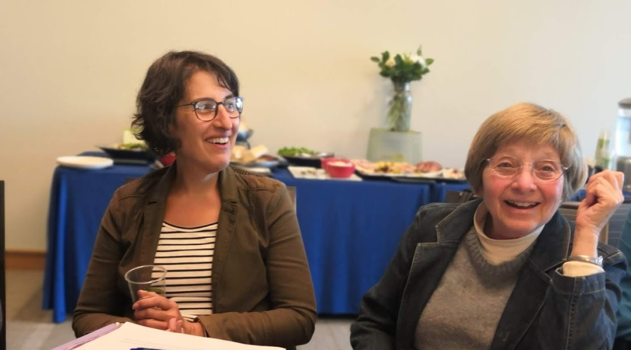Dr. Susan Rahman and Dr. Elaine Wellin smiling during webinar