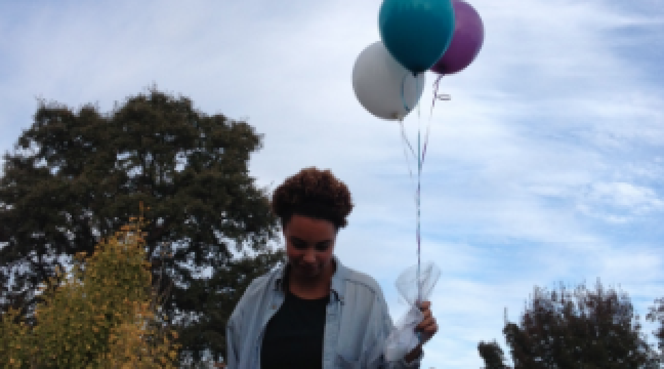 Balloons being released into the air during my service-learning project.