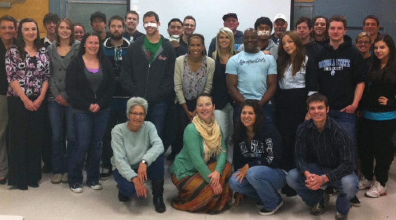 Dr. Liz Thach and a group of service learning students