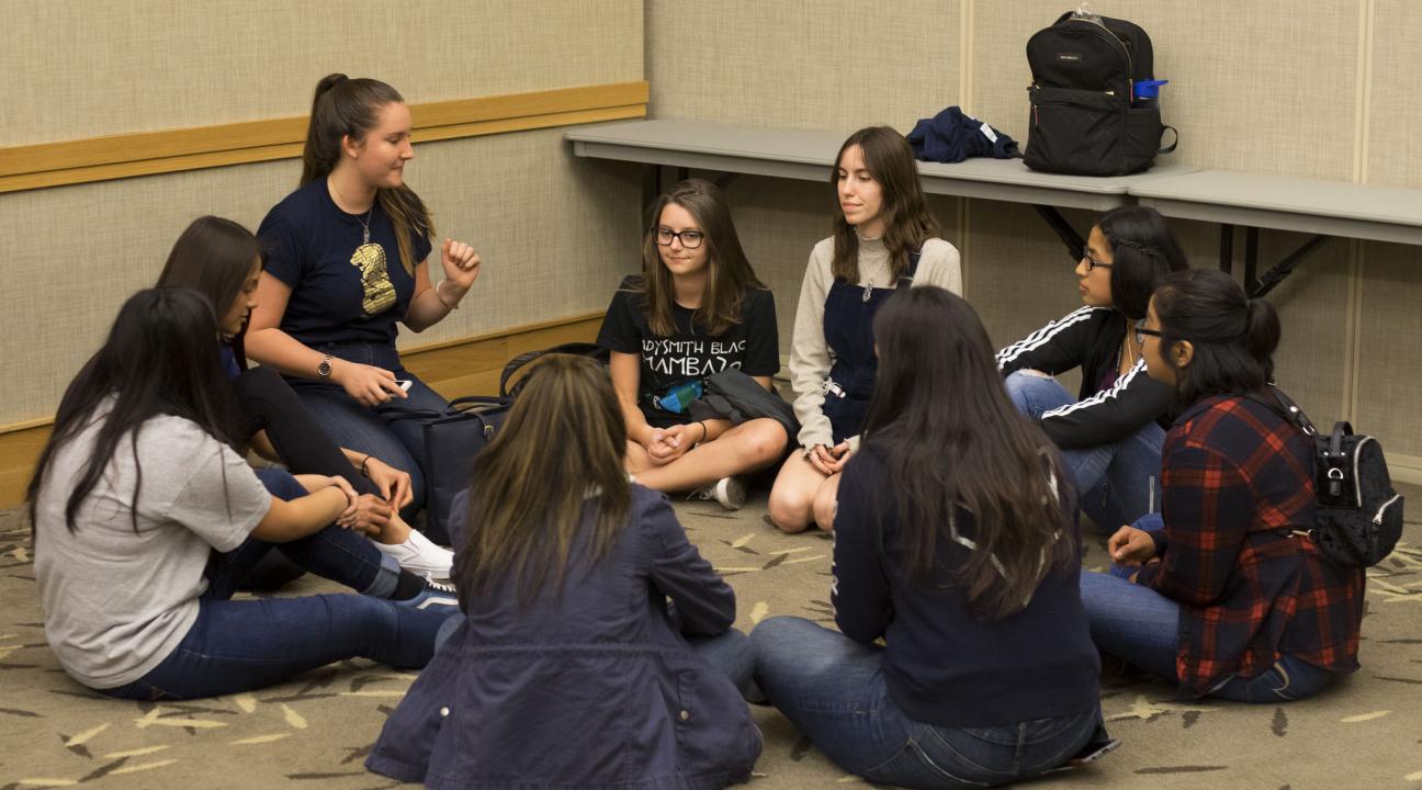 A small group of students listening to their SSU guide during discovery day