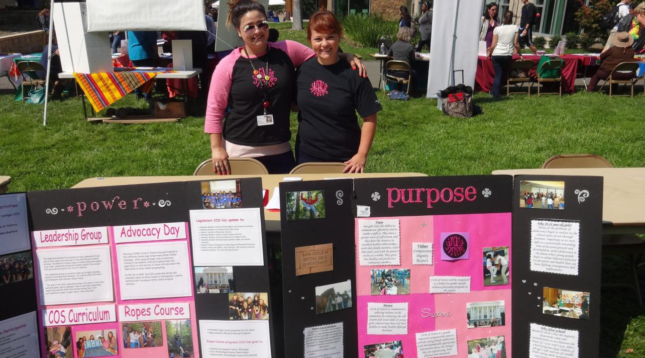 Mira Fielding and Circle of Sisters colleague tabling at the 2014 Service & Internship Fair.