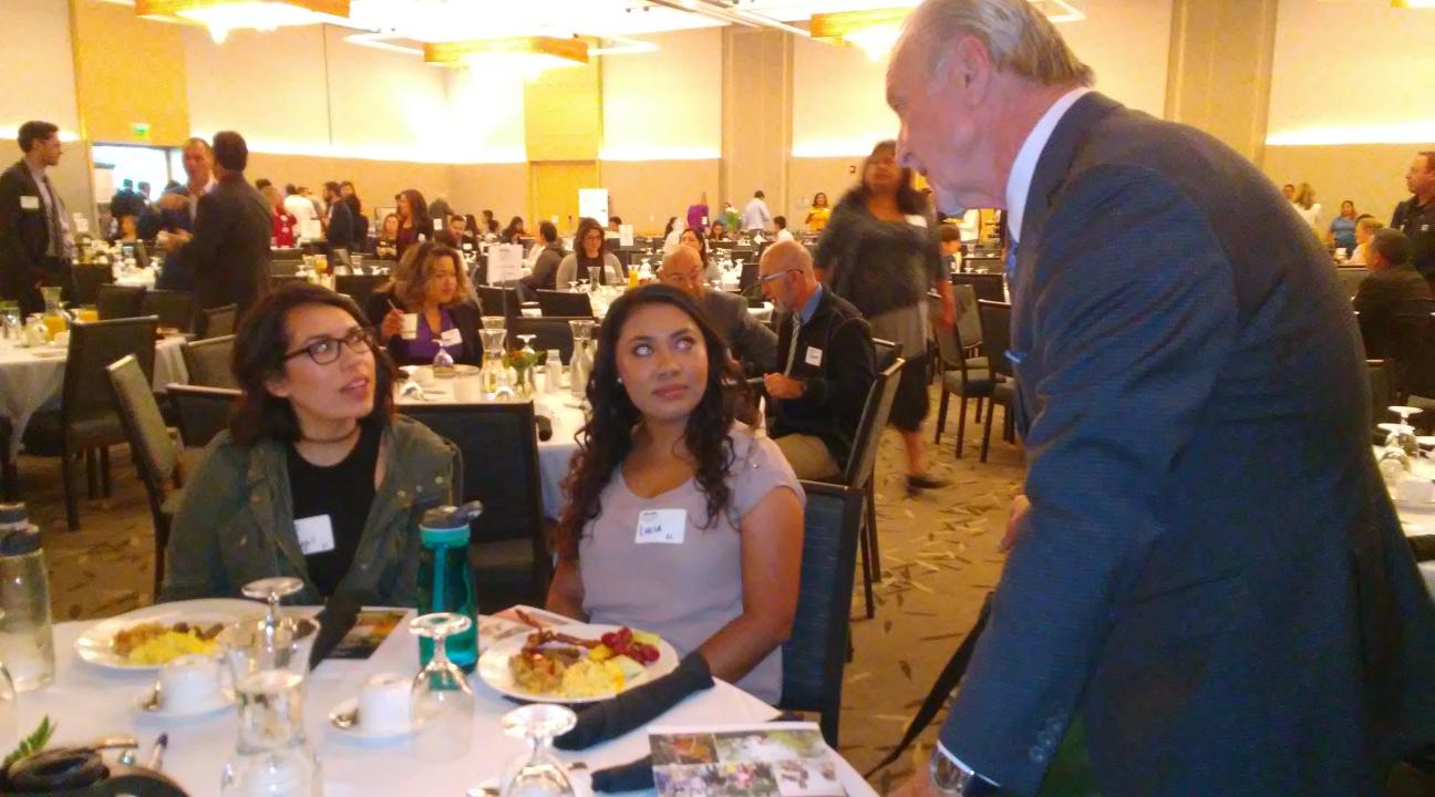 Lucia Martinez and Abigail Gonzalez from On The Move talking with Sonoma County Sheriff candidate John Mutz.