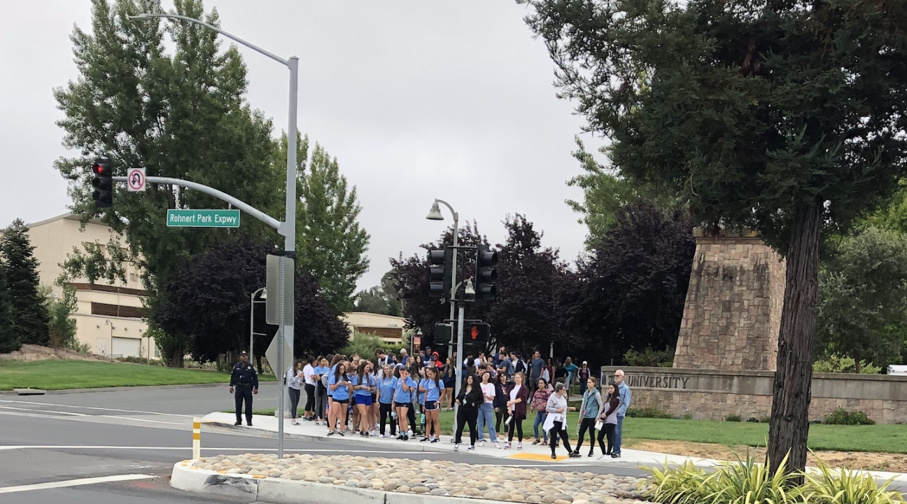 Students gathering at crosswalk outside SSU
