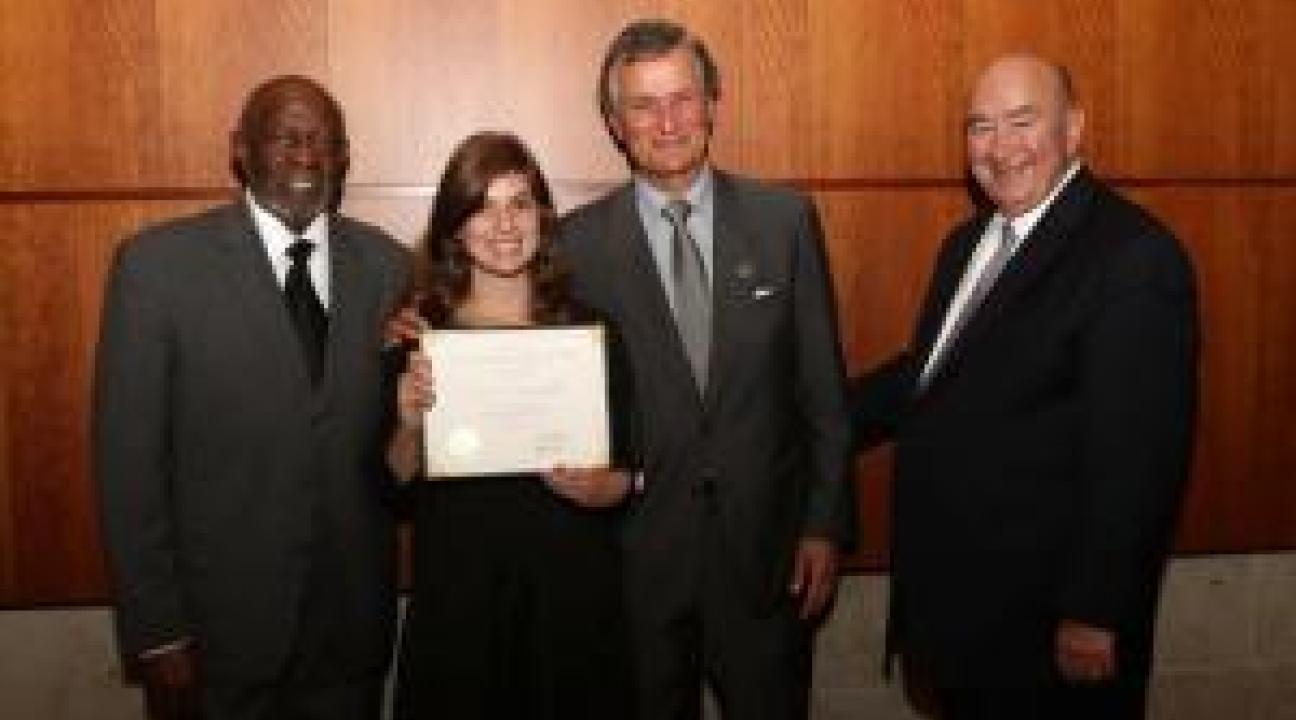 Natalie Hambalek shows off her award