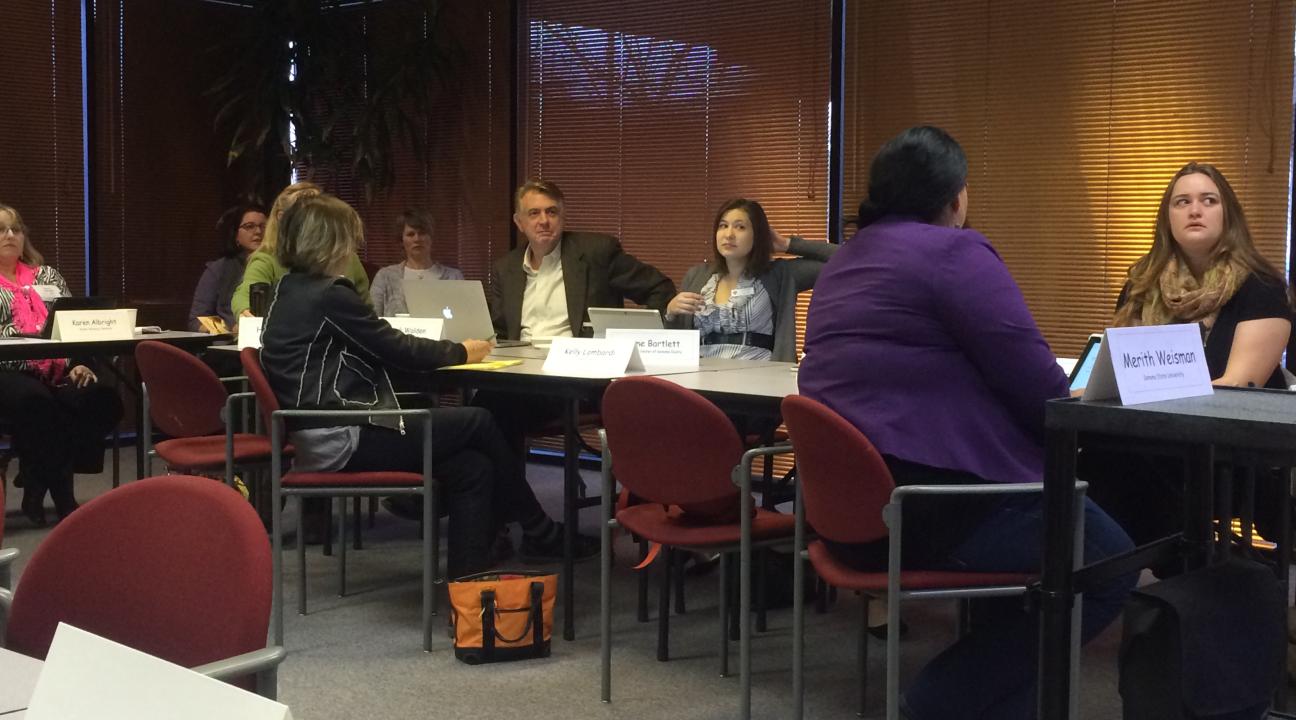 Nonprofit professionals listening to a Social Jeopardy question.