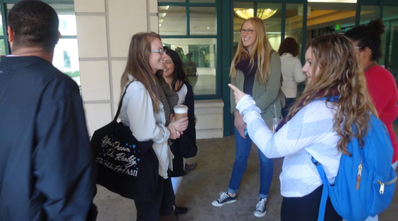 Shadow Day group debriefing after their tour of the library.