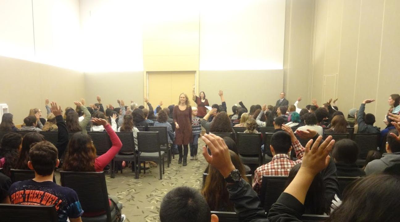 RUP students raising their hands after the CCE Coordinator Merith Weisman asks, "Who wants to go to college?"
