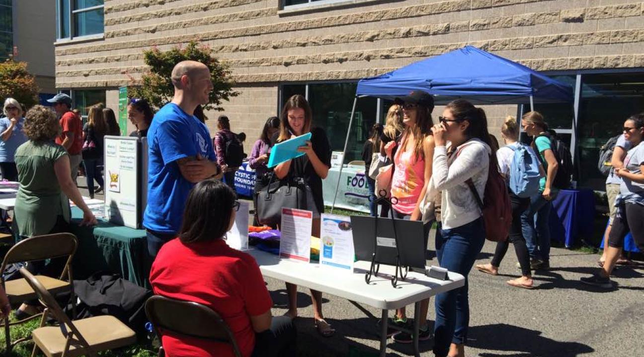 Whitney Chiriboga, Madison Waller, and Megan Kovacevich talking to the Boys & Girls Clubs of Sonoma Valley at the 2016 Fair.