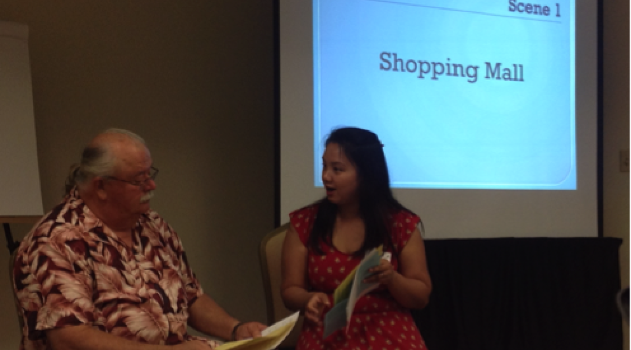 Trang Le, a Student Health Coach, role plays working with a community member to better understand how to manage his health information.
