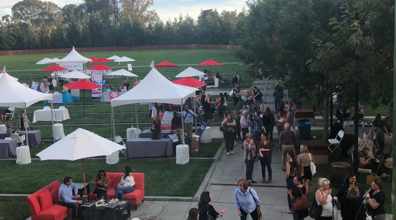 Shot of the GMC lawn filled with people