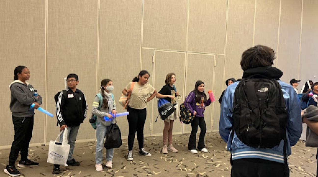 Visiting students checking in for event