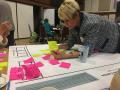 Finance Director, Betsy Howze using post-its and brainstorming