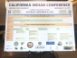 poster board with the schedule of the conference