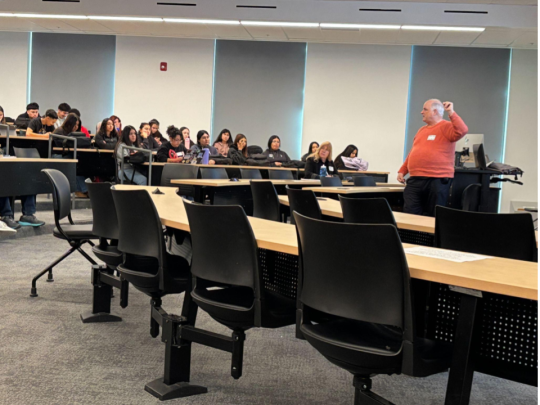 Students shadowing robotics course