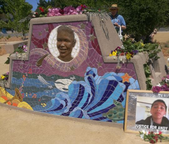 Stone and mosaic memorial depicting Andy Lopez