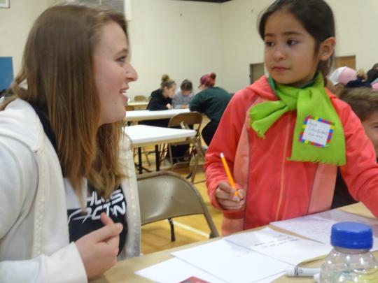 Luther Burbank student book author and illustrator collaborating with SSU service-learner.