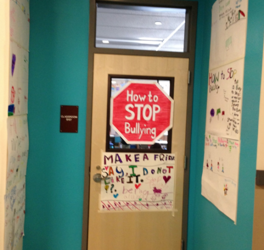 Students made colorful informative posters to educate the school about bullying.