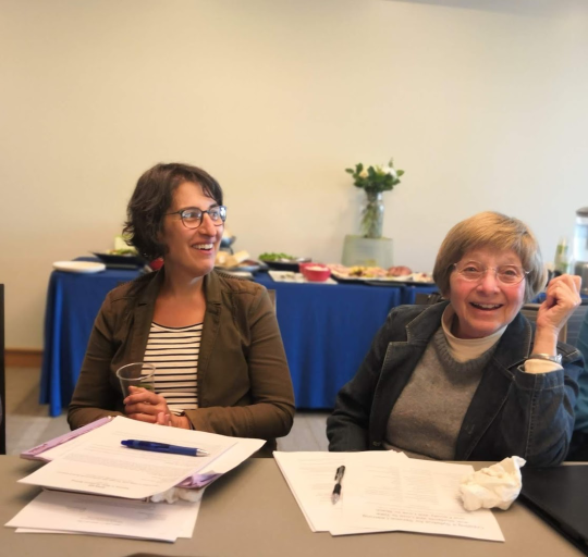 Dr. Susan Rahman and Dr. Elaine Wellin smiling during webinar
