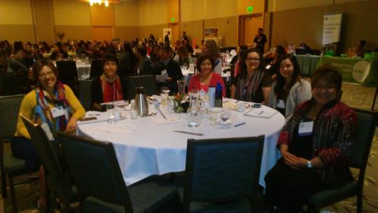 SSU Psychology professor Elisa Velasquez-Andrade (far right) with Latino Health Forum attendees.