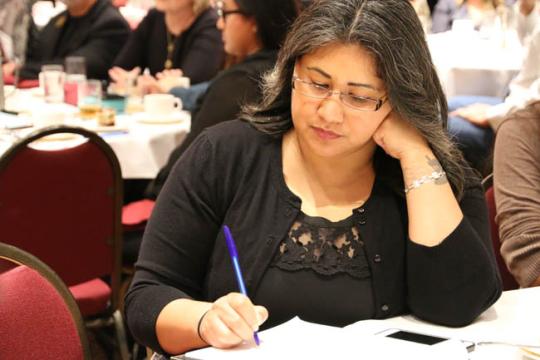 Mariana Garcia Martinez taking notes