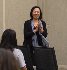 President Judy Sakaki speaking to UNIV150 student prior to start of Shadow Day.