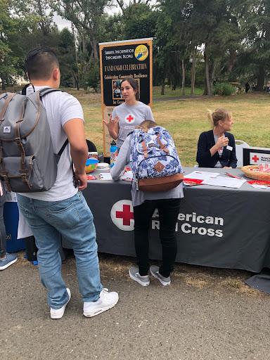 Student at the Red Cross table at a resource fair