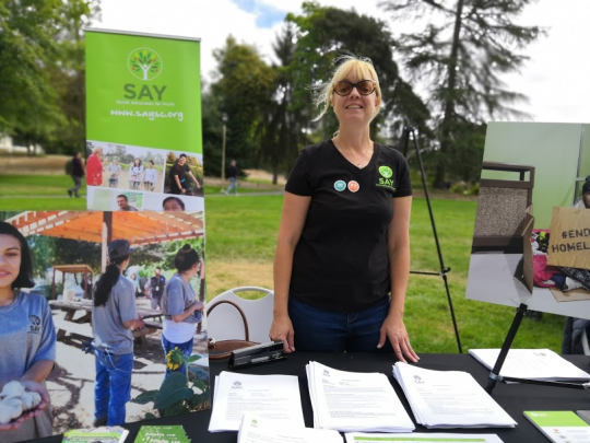 SAY volunteer at campus tabling event