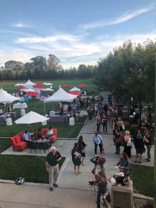 Shot of the GMC lawn filled with people