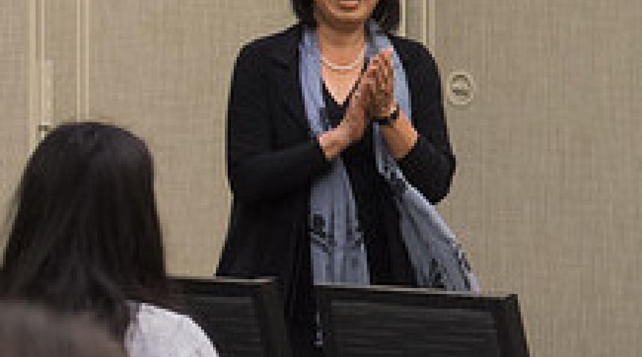President Judy Sakaki speaking to UNIV150 student prior to start of Shadow Day.